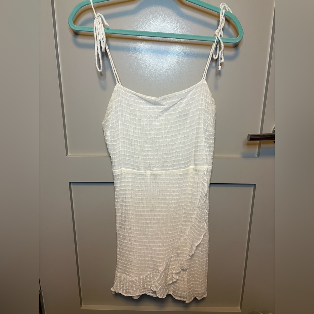 White spaghetti strap dress with bow ties